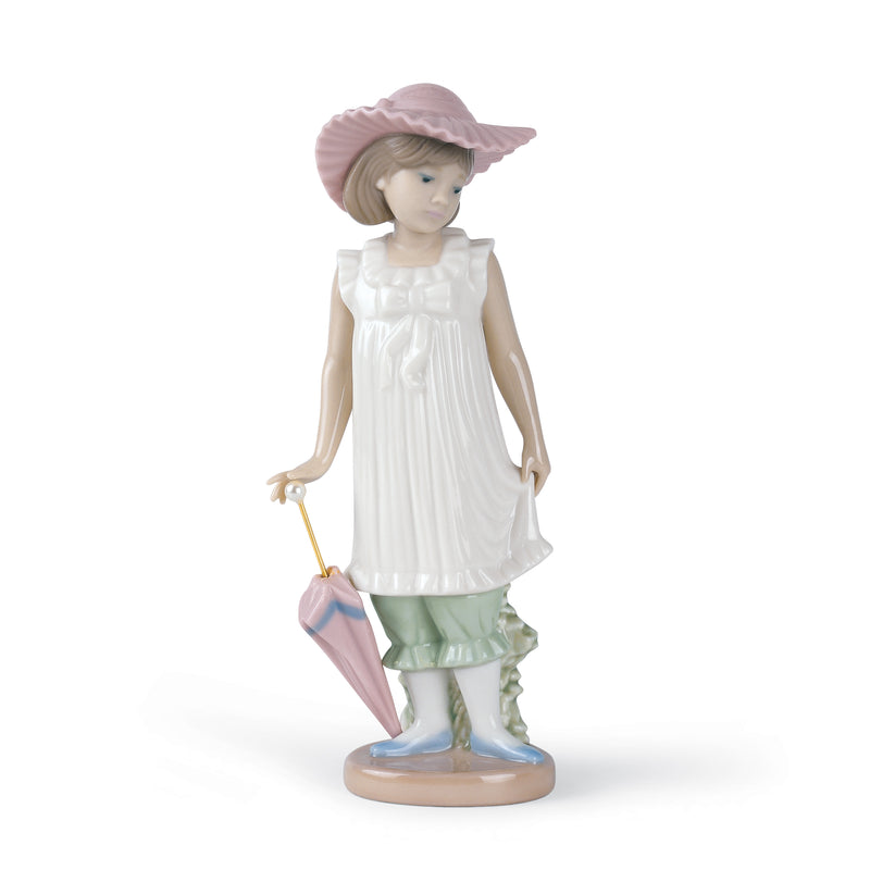 Nao April Showers porcelain figurine of girl in white dress, pink hat, holding umbrella