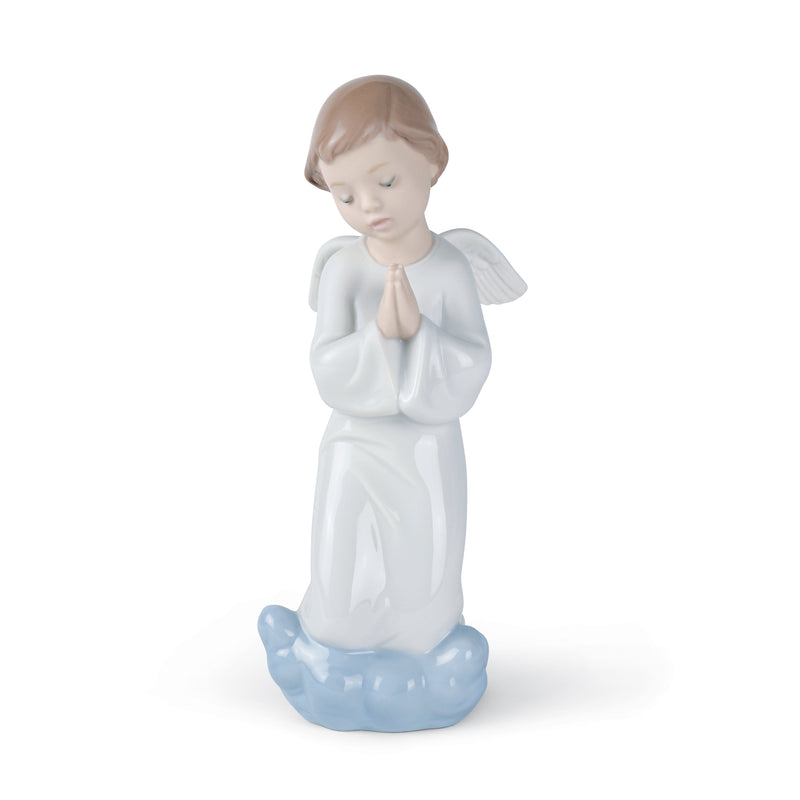 Praying angel porcelain figurine, white dress and blue base, hands together