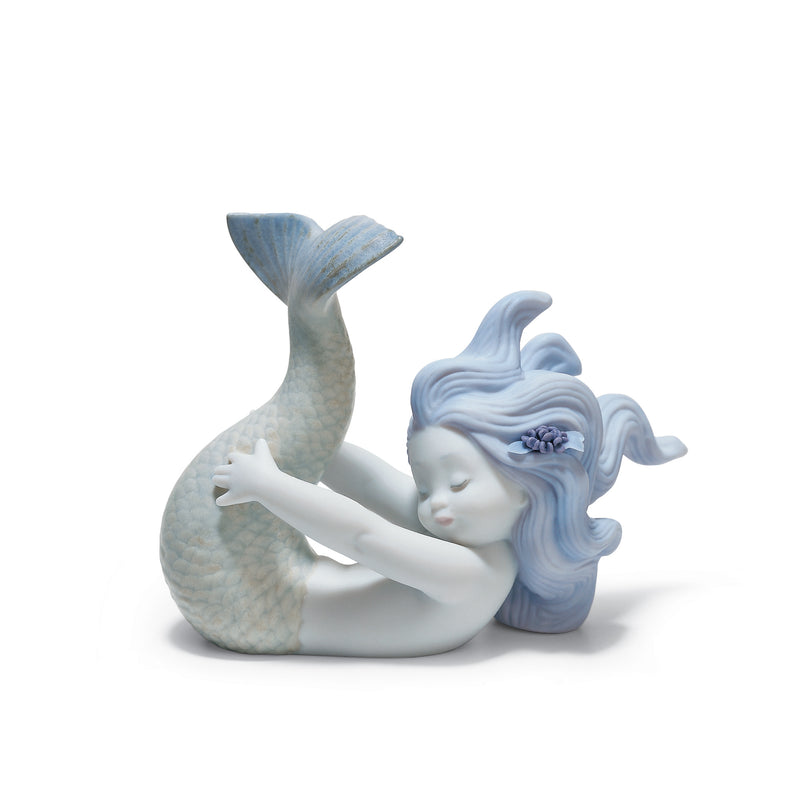 Lladro porcelain mermaid figurine, reclining with blue flowing hair and tail