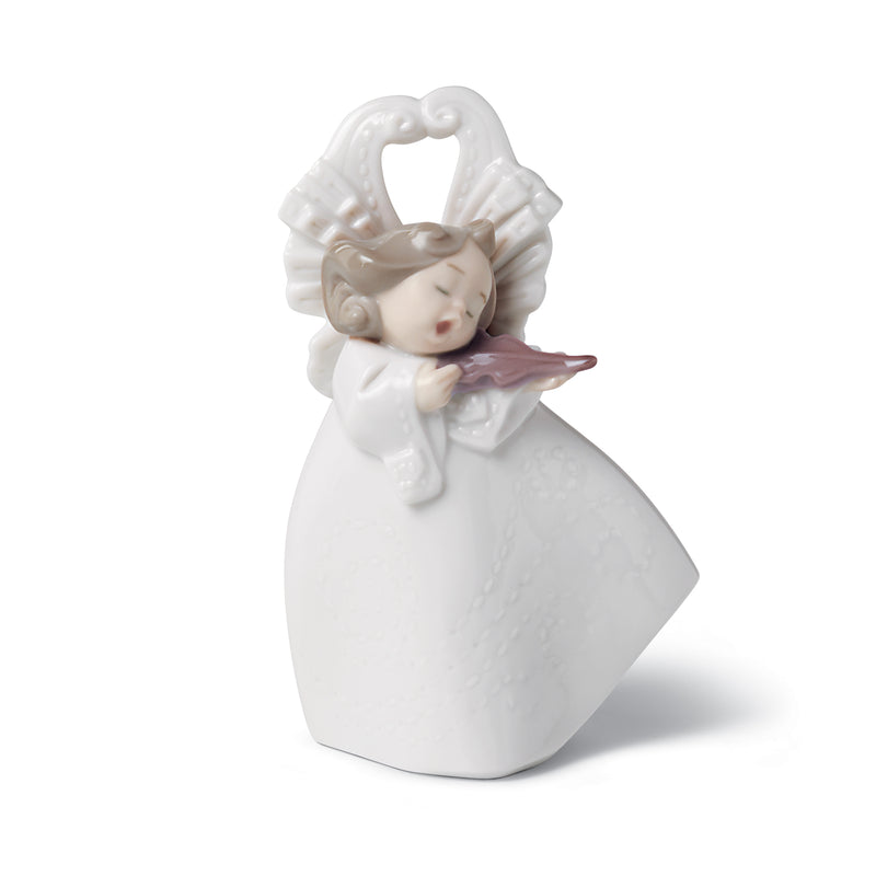White porcelain figurine of a girl holding and playing a string instrument, standing
