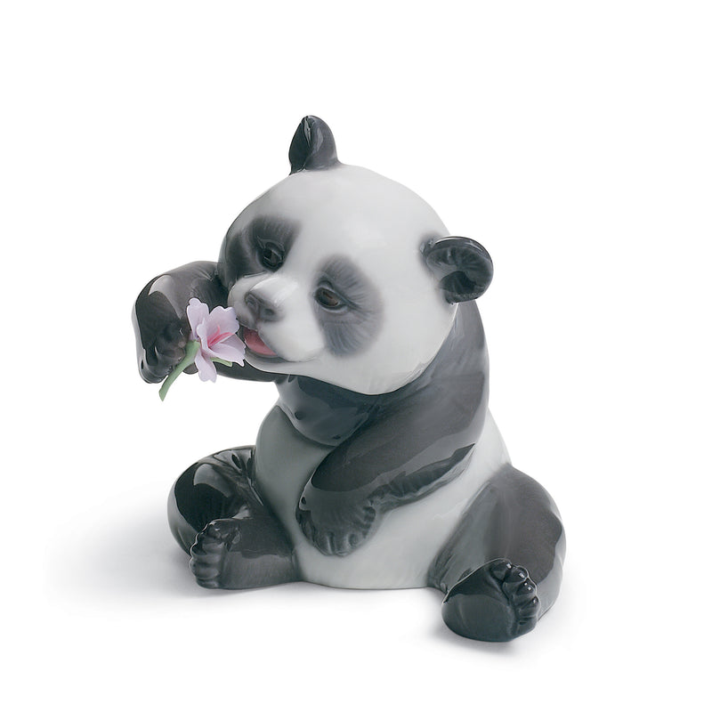 Lladro panda porcelain figurine with pink flower, seated pose