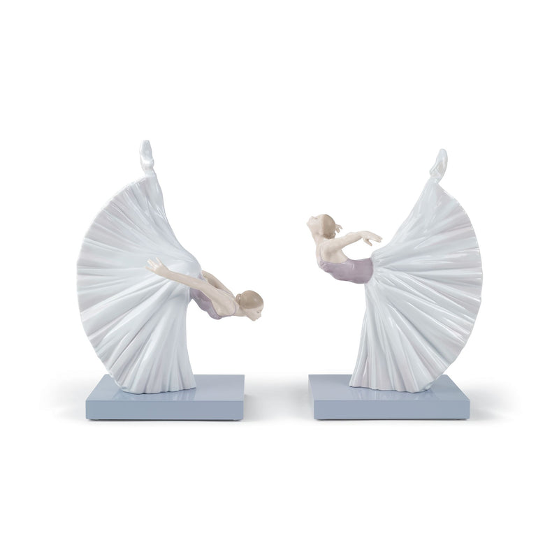 Lladro porcelain ballerina figurine pair with flowing white tutu skirts and raised arms