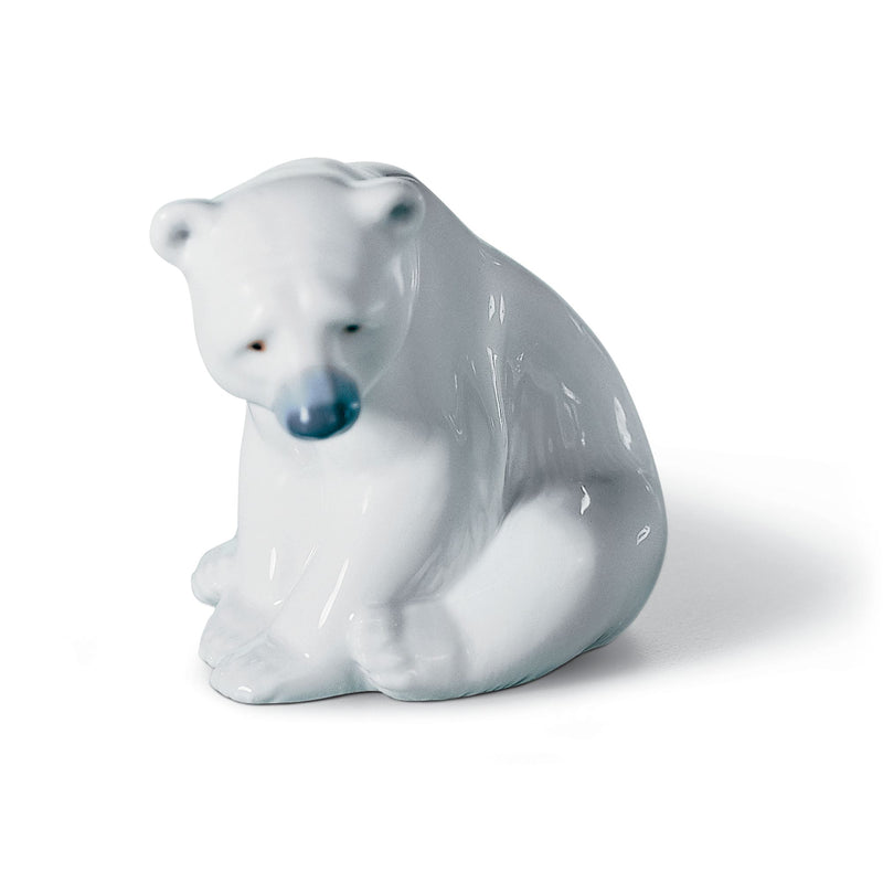 Lladro seated porcelain polar bear figurine, white and light gray glazed finish