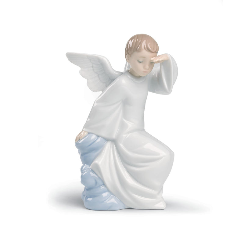 Kneeling angel porcelain figurine in white dress with light-blue wings and base