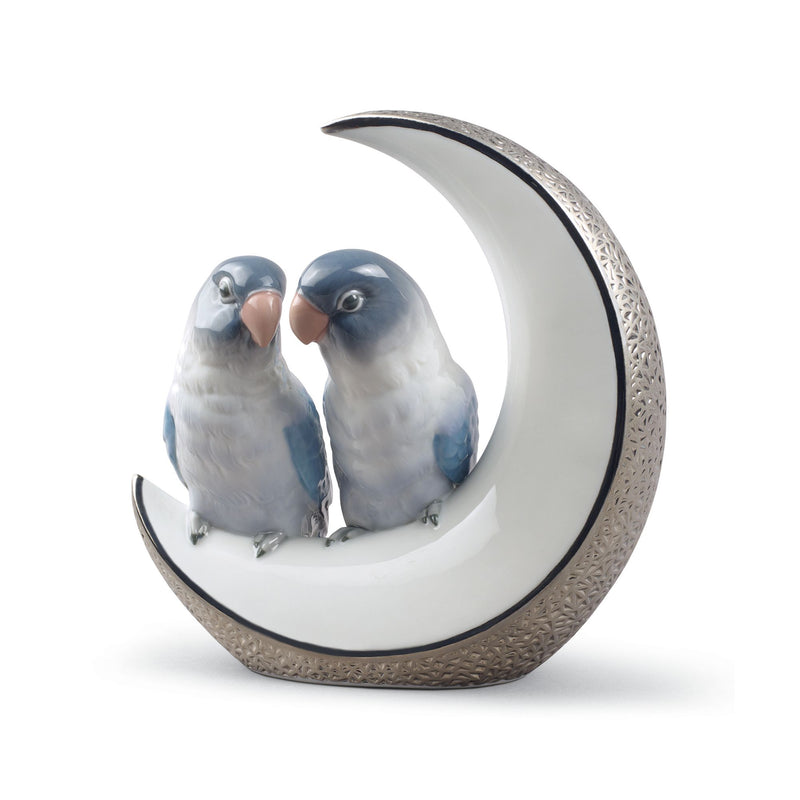 Silvertone porcelain figurine of two blue birds in a crescent moon