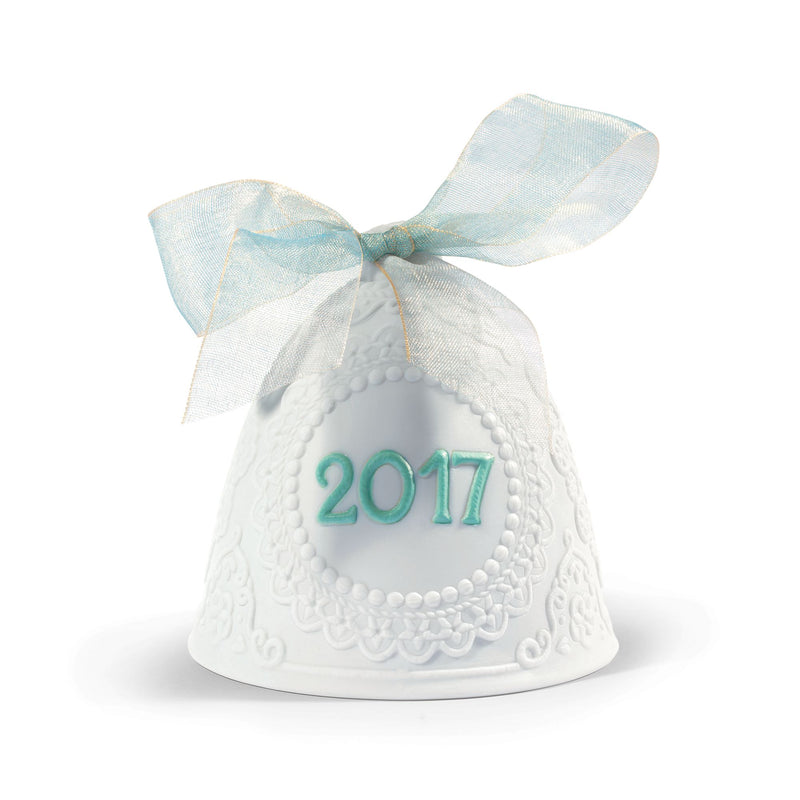 Lladro porcelain bell ornament with white lace trim, light blue bow, and 2017 medallion