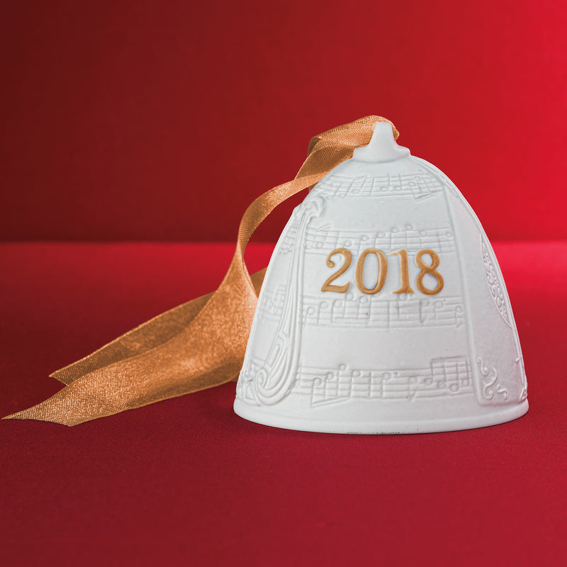 Lladro porcelain bell ornament, white with embossed 2018 and gold ribbon