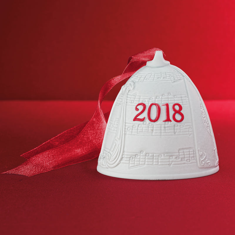 Lladro porcelain bell ornament with white bell and red ribbon, embossed 2018