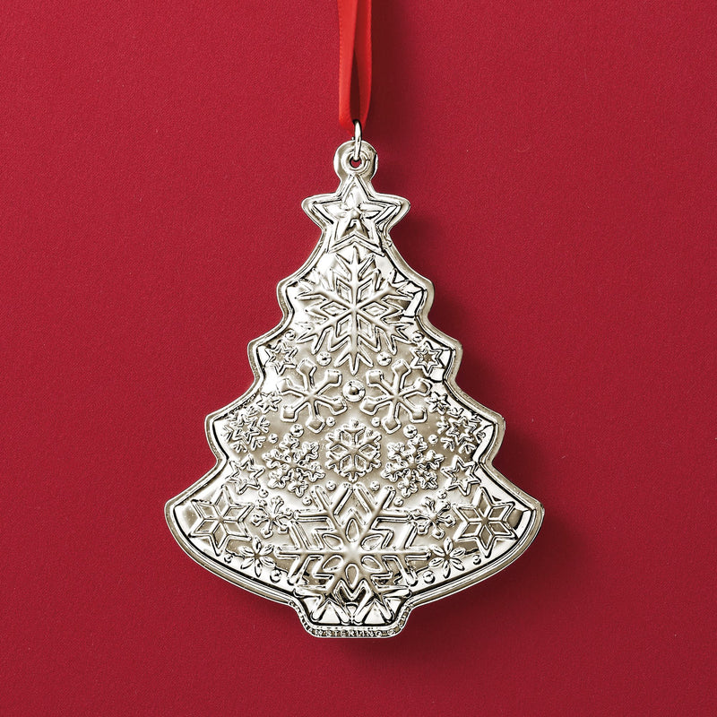 Sterling silver Christmas tree ornament with engraved snowflake and star patterns, hanging loop