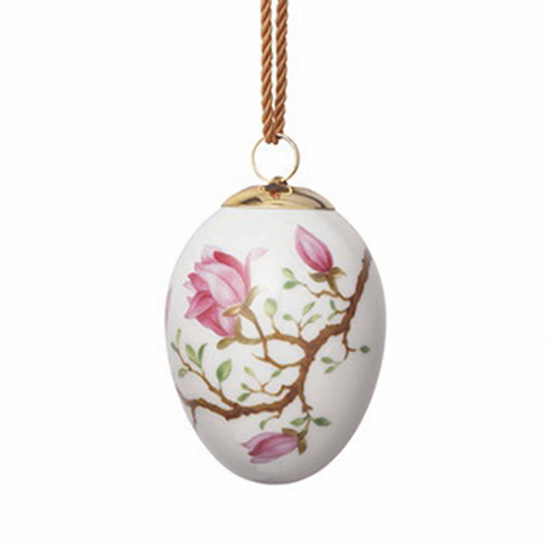 Royal Copenhagen porcelain Easter egg ornament with pink magnolia branches, hanging on cord