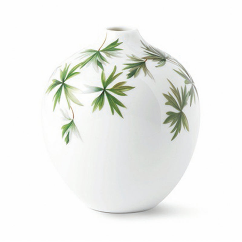 Royal Copenhagen vase with green botanical geranium-style leaves on white ceramic