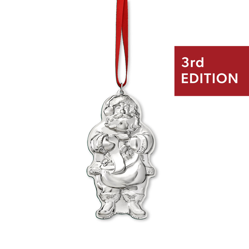 Sterling silver Santa ornament with red ribbon, relief figure holding a sack