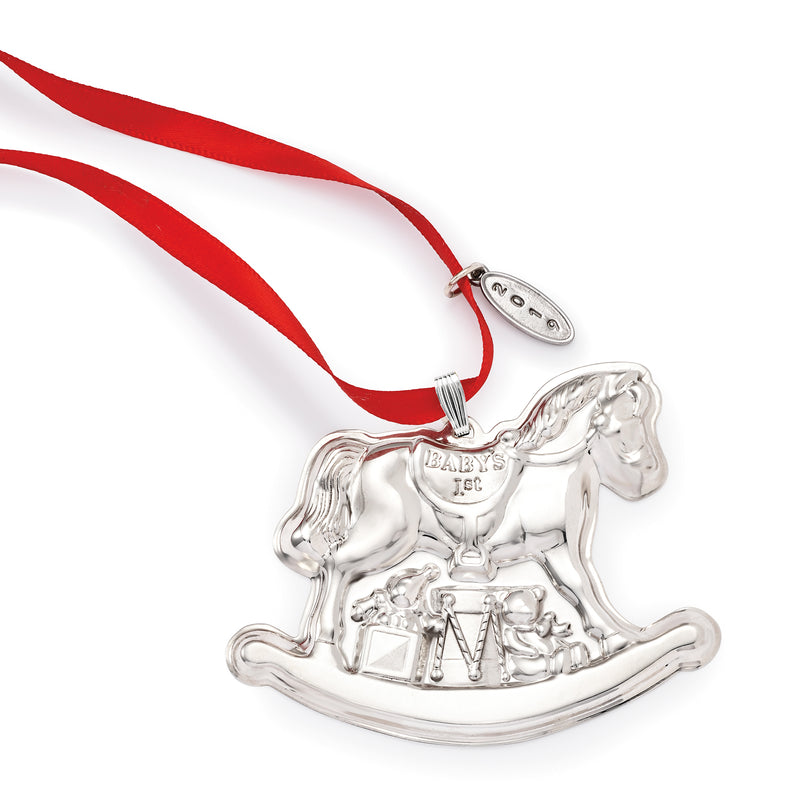Silver rocking horse Christmas ornament with red ribbon and 'BABY'S 1ST'