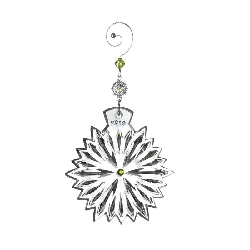 Waterford Crystal snowflake ornament with clear faceted starburst design and green top hanging loop