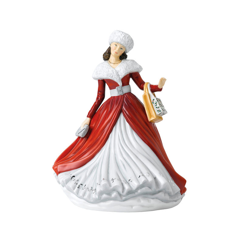 Royal Doulton ceramic figurine of woman in red and white dress, holding shopping bag