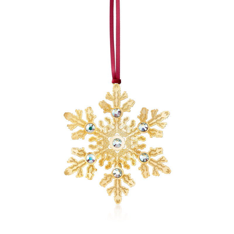 Gold snowflake crystal ornament with blue accents and red hanging ribbon