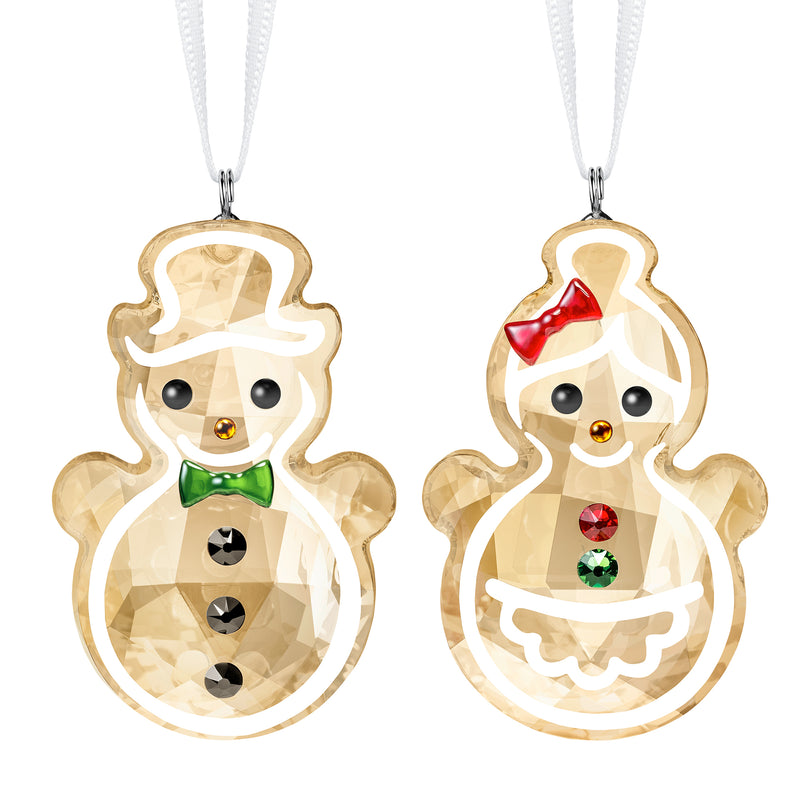 Crystal gingerbread couple ornament set with two dangling cream figures, smiling faces and red bow