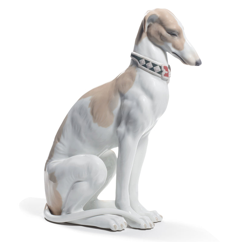 Lladro porcelain greyhound figurine, sitting pose with detailed coat and collar