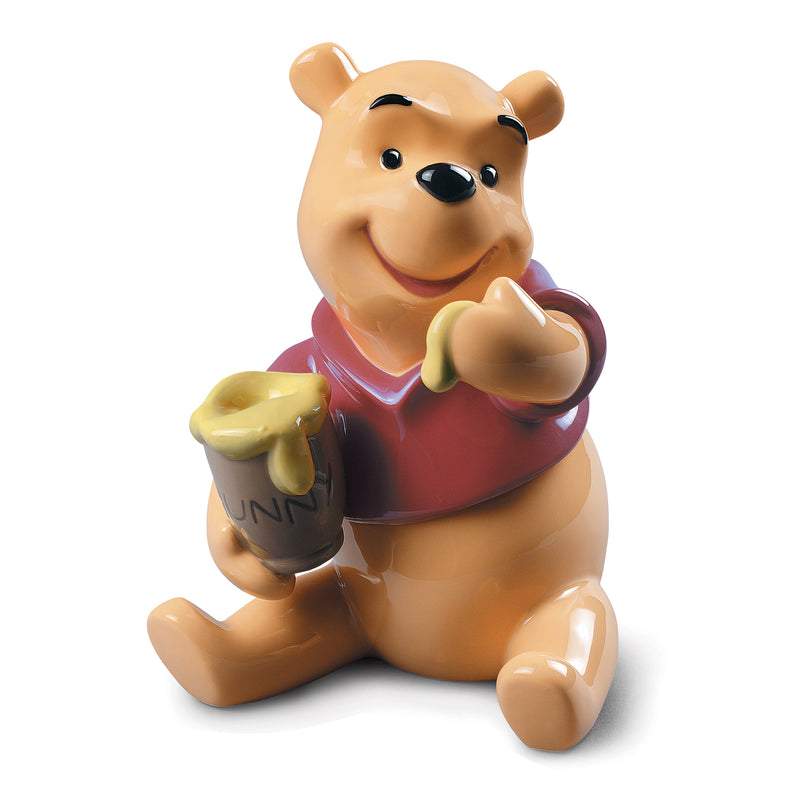 Lladro Winnie the Pooh porcelain figurine seated, holding honey pot