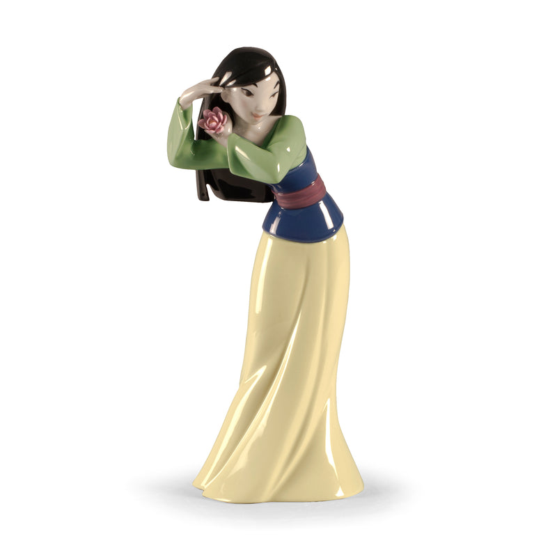 Lladro porcelain figurine of Mulan holding a pink rose, green jacket, blue sash, cream skirt