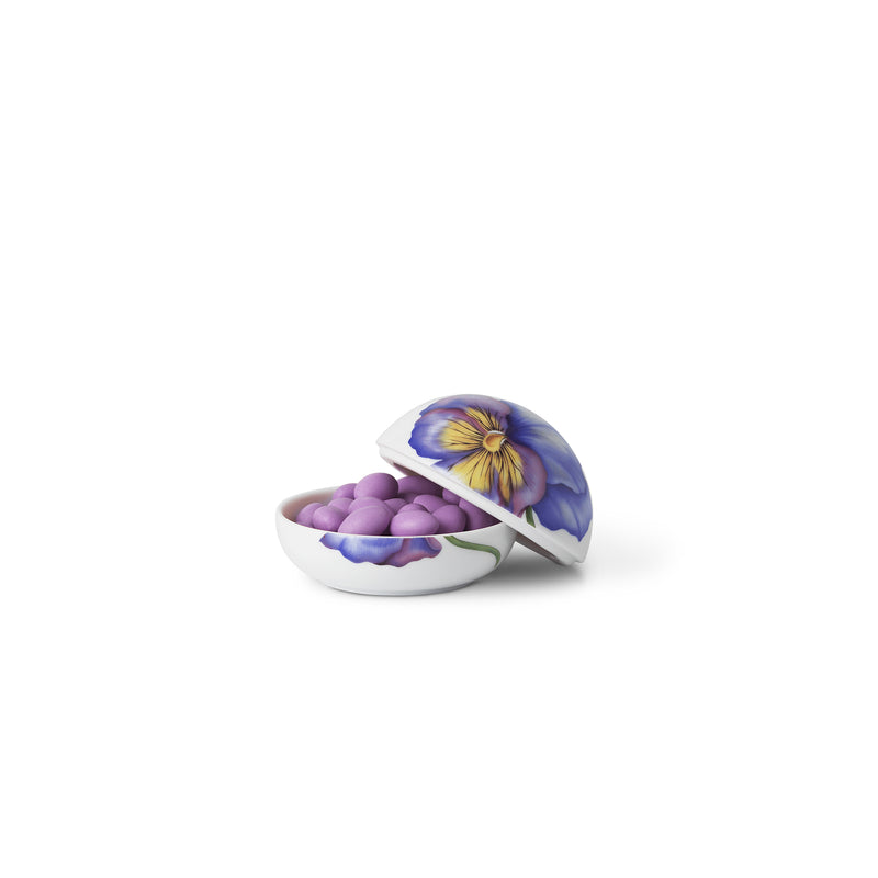 Porcelain Easter egg bonbonniere with purple pansy lid and open base holding candies