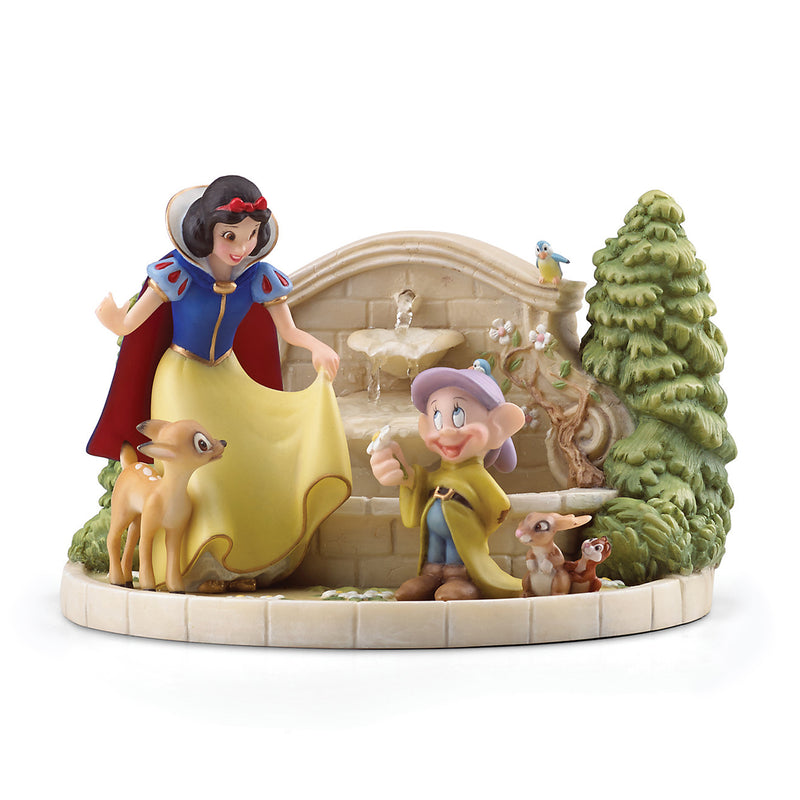 Lenox Disney garden fountain figurine with Snow White, dwarfs, animals, and a pine tree