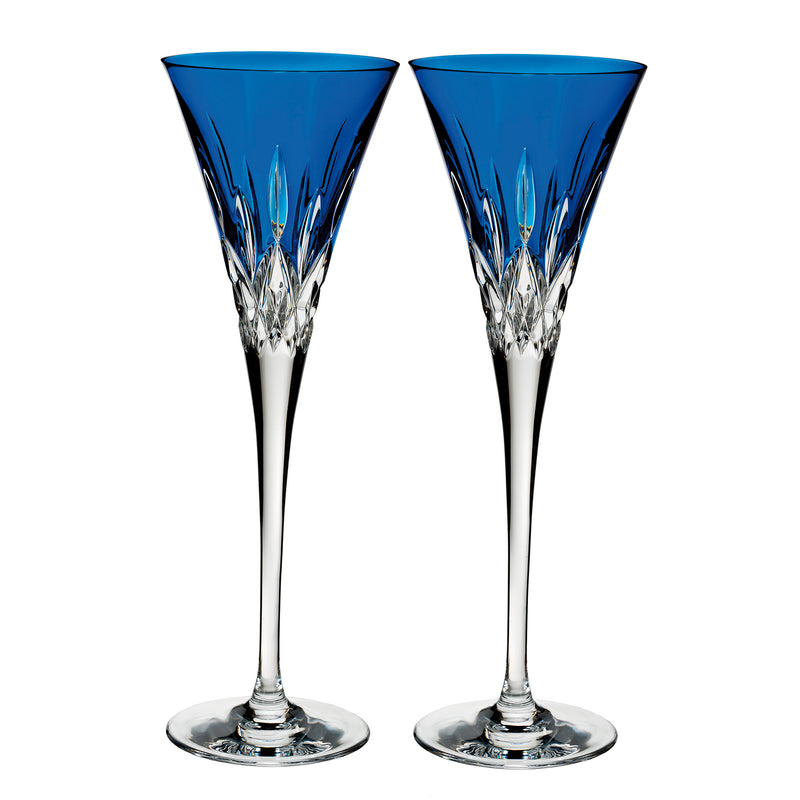 Set of two cobalt blue crystal flute glasses with Lismore pattern, clear bases