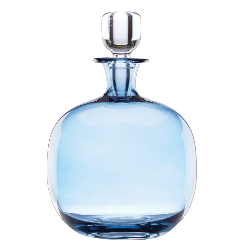 Blue glass decanter with round body and clear glass stopper