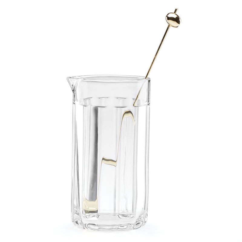 Clear glass cocktail carafe with gold-toned stirrer, square tumbler-style jug