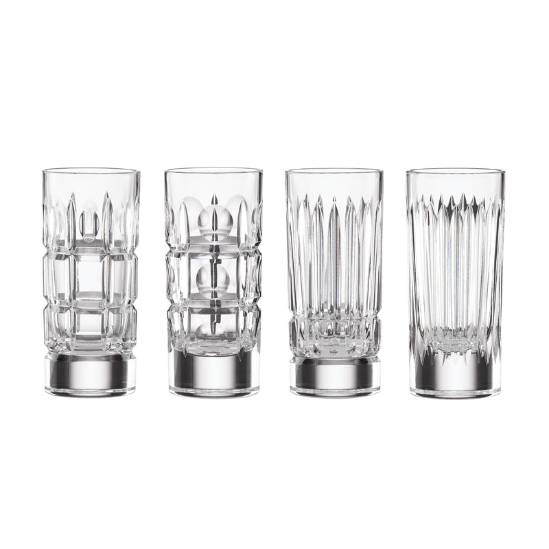 Set of 4 clear glass shot glasses with faceted geometric cuts and pedestal bases