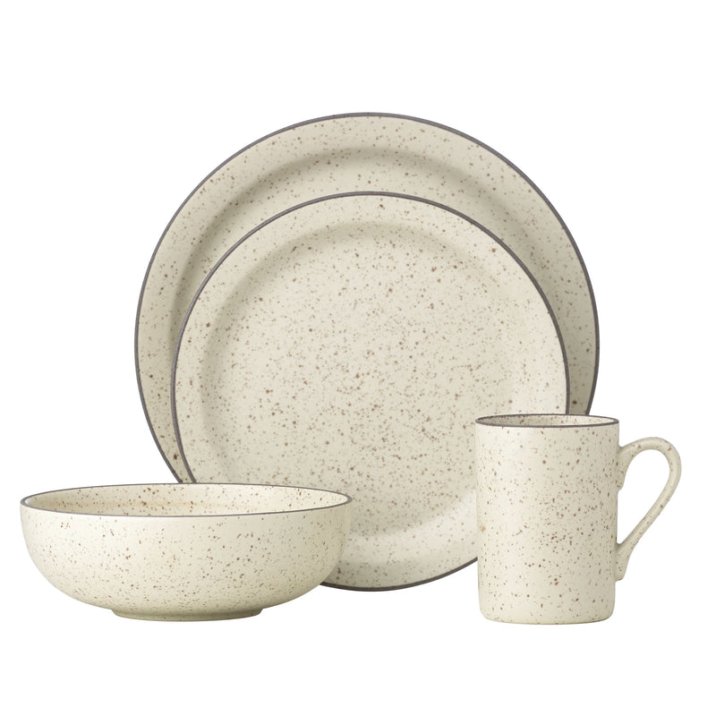 Speckled ceramic dinnerware set with plate, bowl, and mug, beige with dark rim