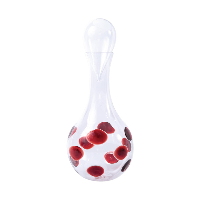 Vietri glass decanter with red drop pattern, bulbous body and narrow neck