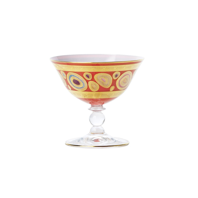 Vietri Regalia orange dessert bowl with swirl pattern and clear stem base