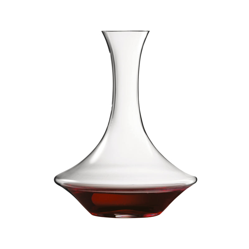 Crystal decanter with narrow neck and flared top, holding amber liquid