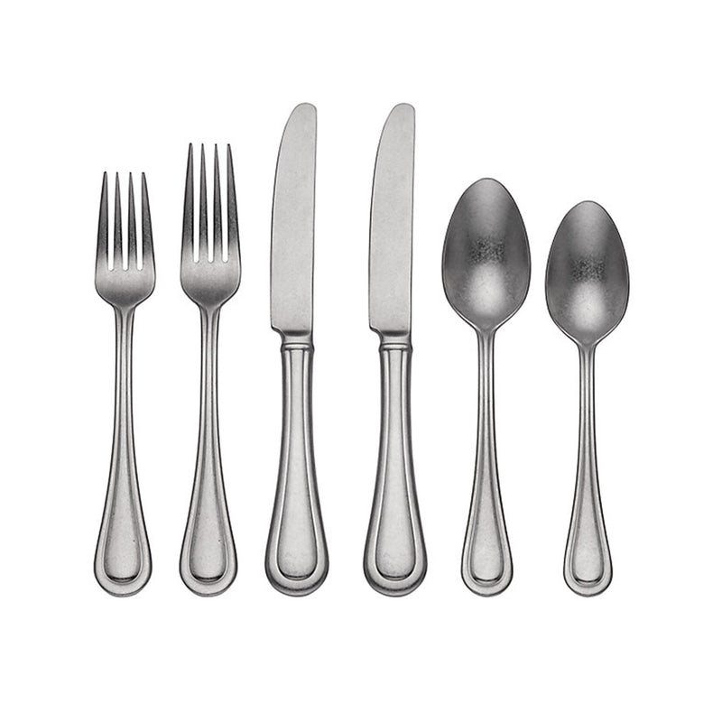 Stainless steel flatware set with textured handles, including forks, knives, and spoons