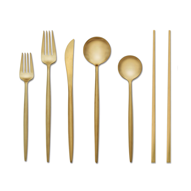 Goldtone stainless steel flatware set with forks, spoons, knives and chopsticks, service for 4