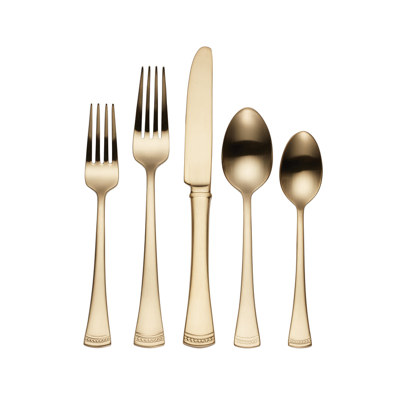 Gold-colored stainless steel flatware set, mixed forks and spoons with ornate handles