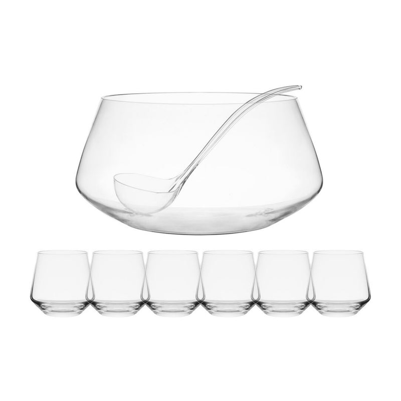 Clear glass punch bowl with serving ladle and small drinking glasses