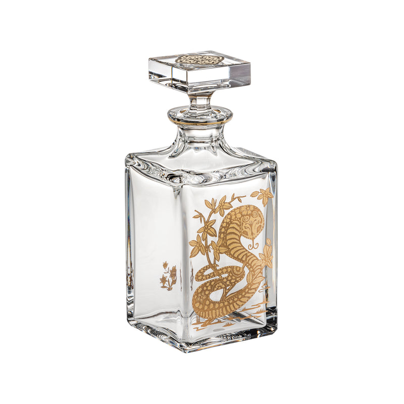 Vista Alegre whiskey decanter with gold snake artwork, clear faceted glass and stopper