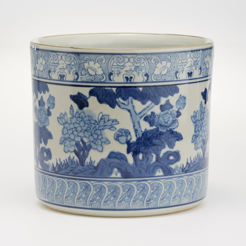 Blue and white porcelain garden planter vase with detailed floral and vine pattern