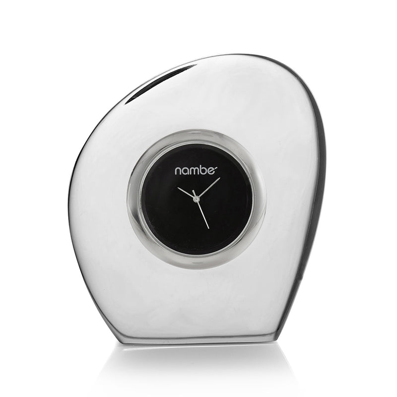 Nambe rim desk clock with brushed metal oval case and black dial, analog hands