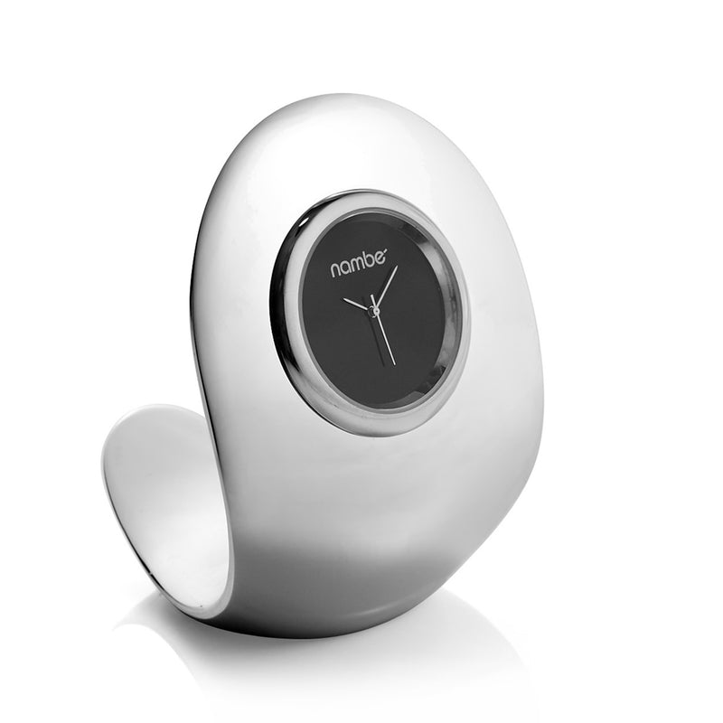 Nambe cobra desk clock with silver oval case and black dial, curved display