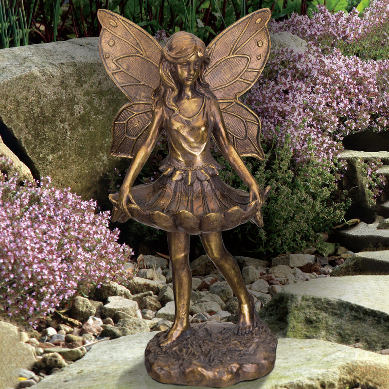 Bronze fairy bird feeder statue with skirt, decorative wings, and raised hands