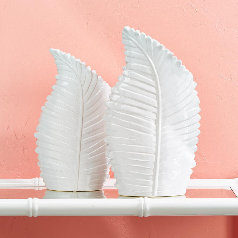 Set of two white ceramic palm leaf vases with ribbed leaf design