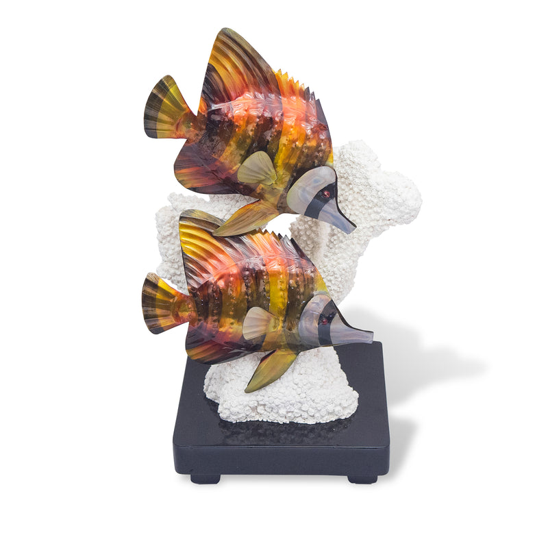 Metal butterfly fish table sculpture with iridescent fins on textured white and dark base