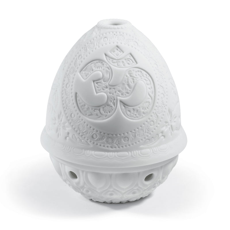 White porcelain lithophane votive light with embossed OM design