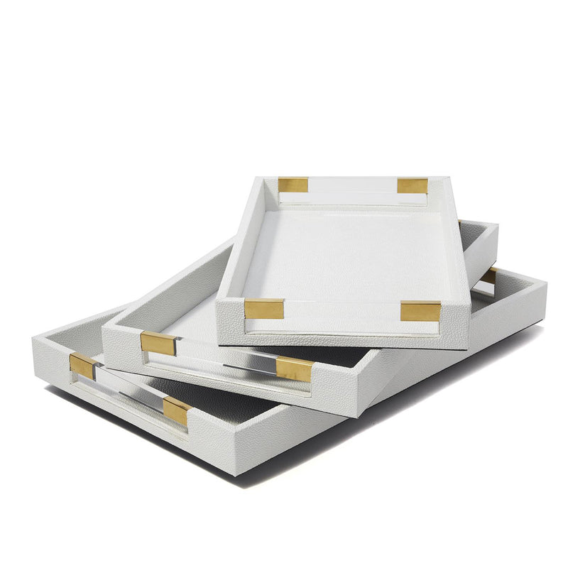 Set of 3 white faux leather decorative trays with gold corner accents, stacked together