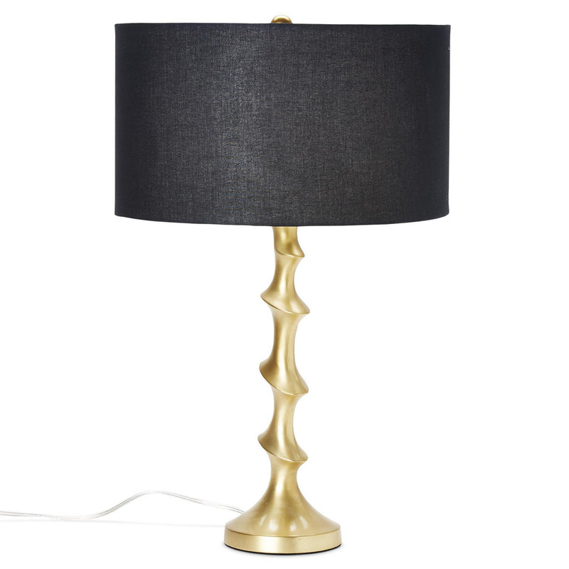 Matte gold and black table lamp with sculpted base and black fabric shade