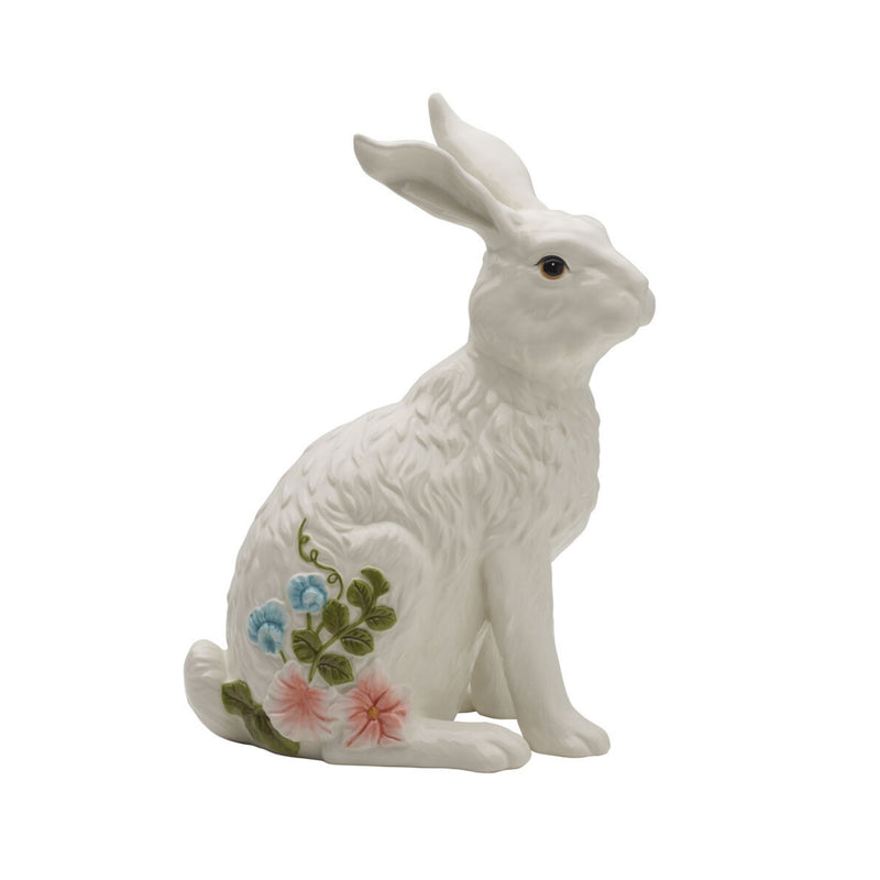 Garden rabbit figurine, white ceramic with blue and pink flowers on belly