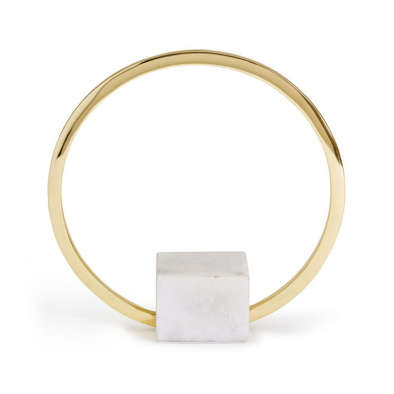 Goldtone circular ring sculpture with white marble base pedestal